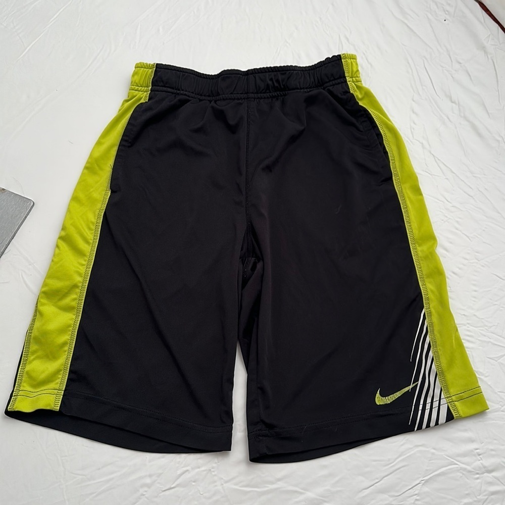 Nike black and yellow green trim and swoosh athletic shorts